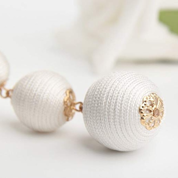 Dangle white ball statement earring - Picture 3 of 4